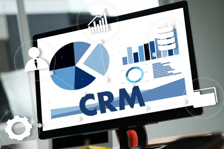 CRM dashboard with charts and analytics on computer screen